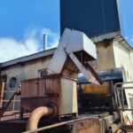 dégrilleur automatique incliné DM-TI Viti installé en caisson inox - distillerie VILLENEUVE