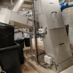 Ensemble dégrilleur automatique incliné DM-TI et compacteur DM-CV installés sur la STEP de La Cavalerie