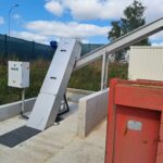 Ensemble dégrilleur automatique DM-TI et convoyeur à vis DM-VC installés sur abattoir de Limoges