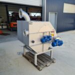 Ensemble tamis rotatif-compacteur DM-TRCV destiné à être installé sur la STEP de Labastide d'Ajou (11) , en attente de livraison