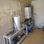 Skid de pressurisation DM-SKP11 installé dans un local technique hors-gel